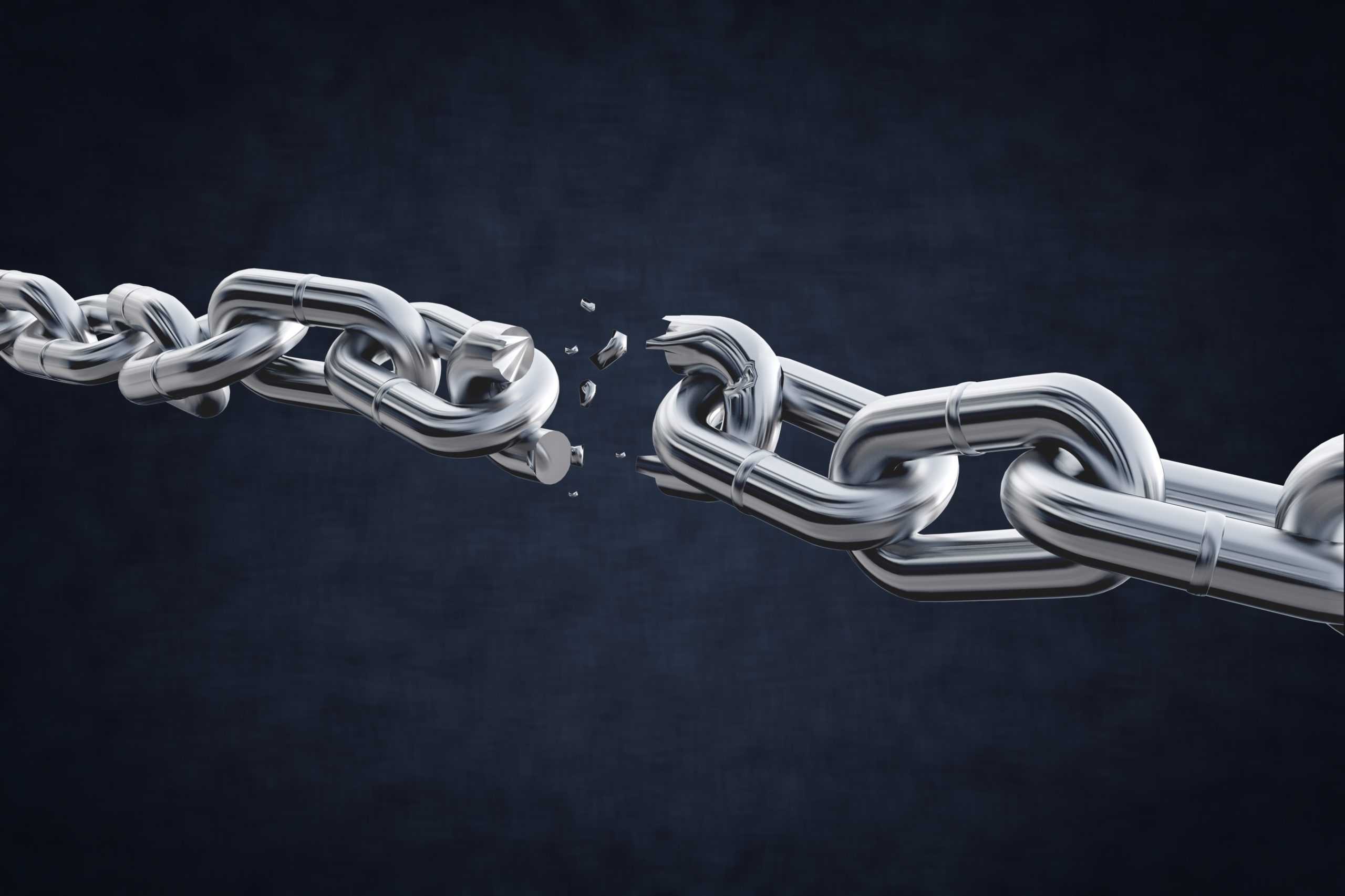 broken-metal-chain-on-background-scaled